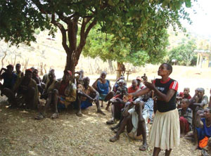 A health professional presenting information to the community.