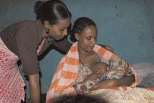 Health professional counselling a mother on exclusive breastfeeding