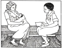 A health professional counselling a mother