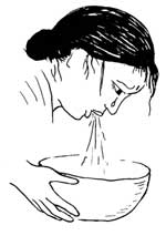 A woman vomiting due to morning sickness