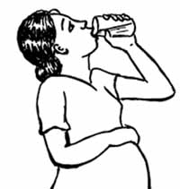 A pregnant woman drinking a glass of water