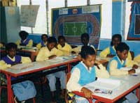 Children in a classroom during a lesson.